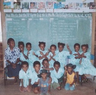 The children of Vesulogo in their new classroom.