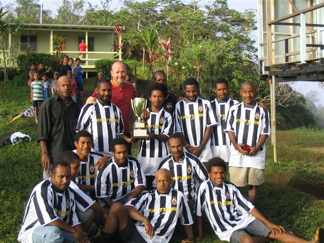 Aidan Grimes presenting the winners with the 