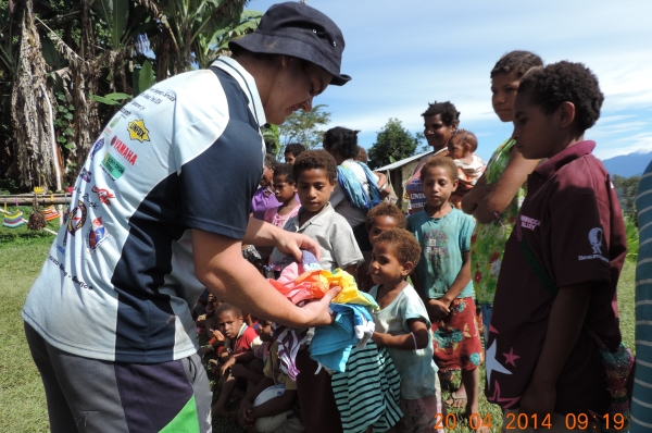 NSW Police Legatees Giving Aid to Children on Kokoda Track ANZAC 2014