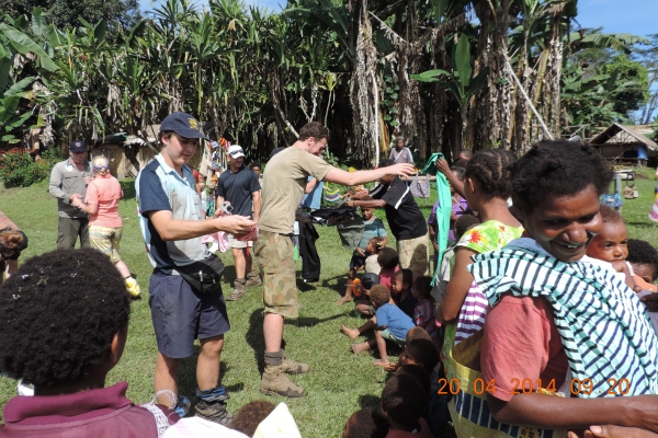 NSW Police Legatees Giving Aid to Children on Kokoda Track ANZAC 2014